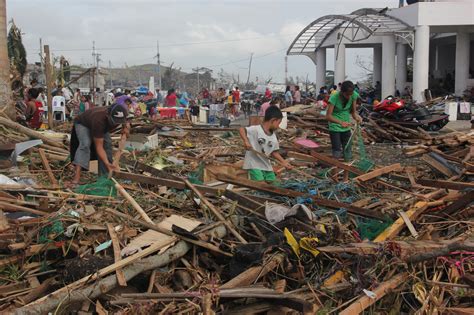 Filipinos in typhoon.